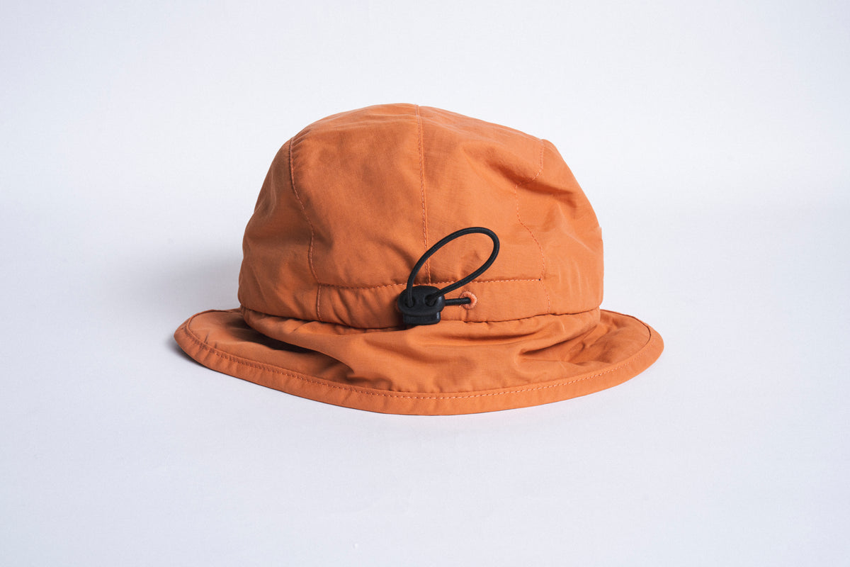 Dwr Flap Cap - Nutmeg